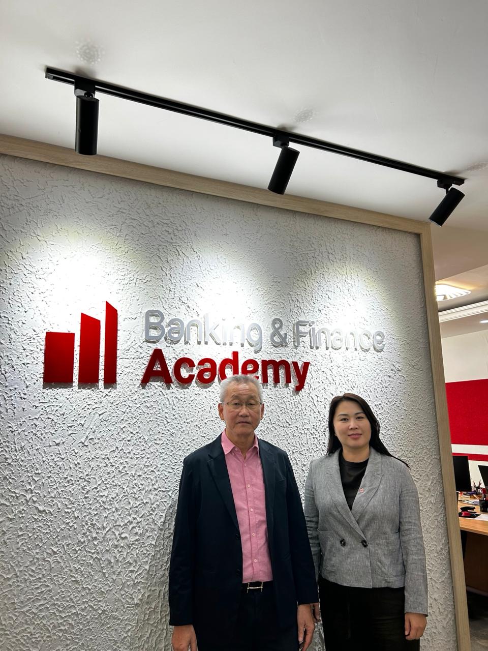 2. Photo, Kenny Tay with CEO of the Banking and Finance Academy, Mongolia. BFA