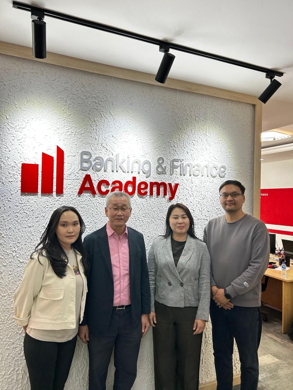3. Photo, Kenny Tay with staff and CEO of the Banking and Finance Academy, Mongolia. BFA